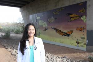 EMCC alumna Monica Gomez-Lopez and her mural